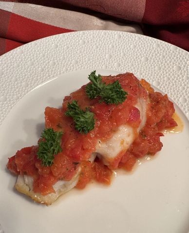 Stuffed sole roulade with spinach pine nuts and tomato relish